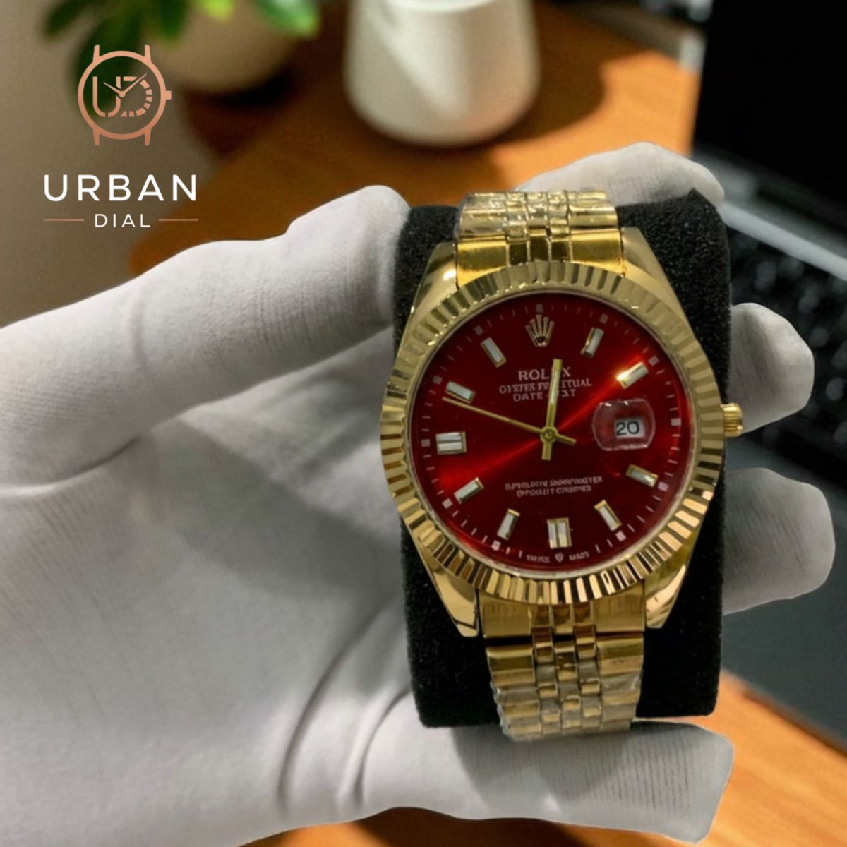 A gold-tone Rolex Oyster Perpetual Datejust with a fluted bezel and jubilee-style bracelet