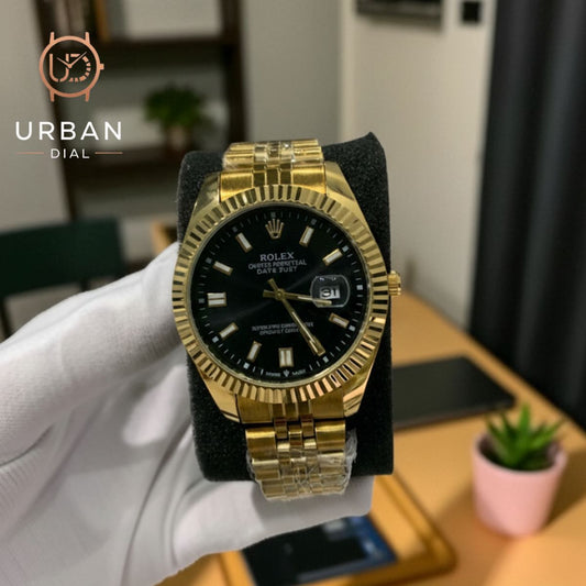 A gold-tone Rolex Oyster Perpetual Datejust with a fluted bezel and jubilee-style bracelet